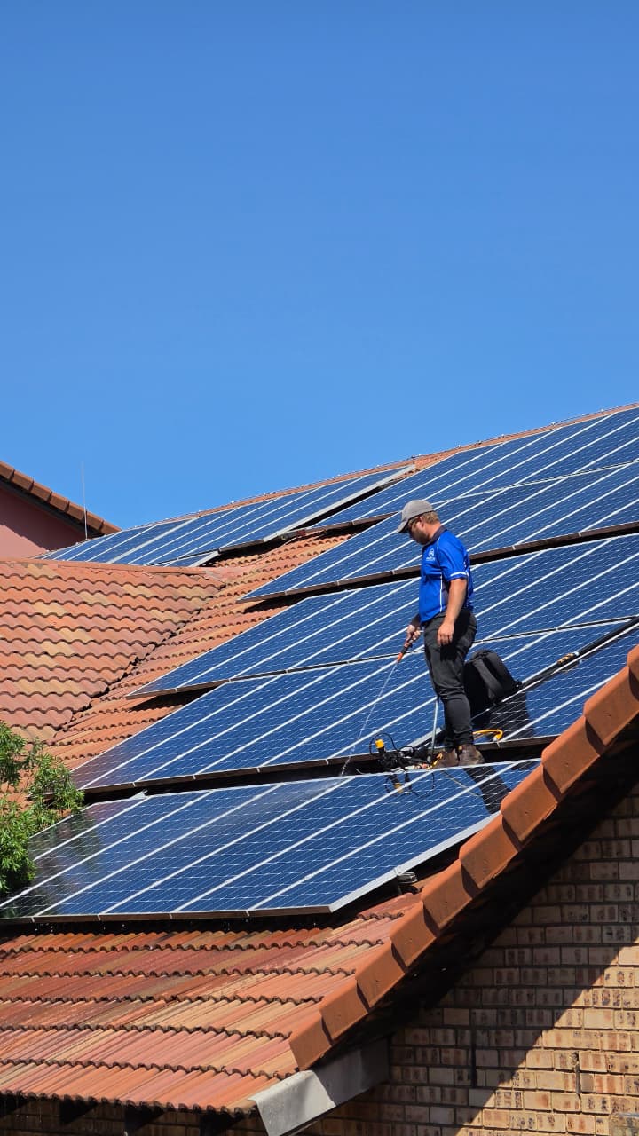Solar panel cleaning project — RobCon technician on site