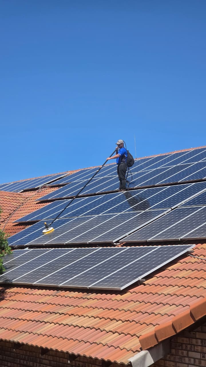 Solar panel cleaning project — Residential roof clean in progress