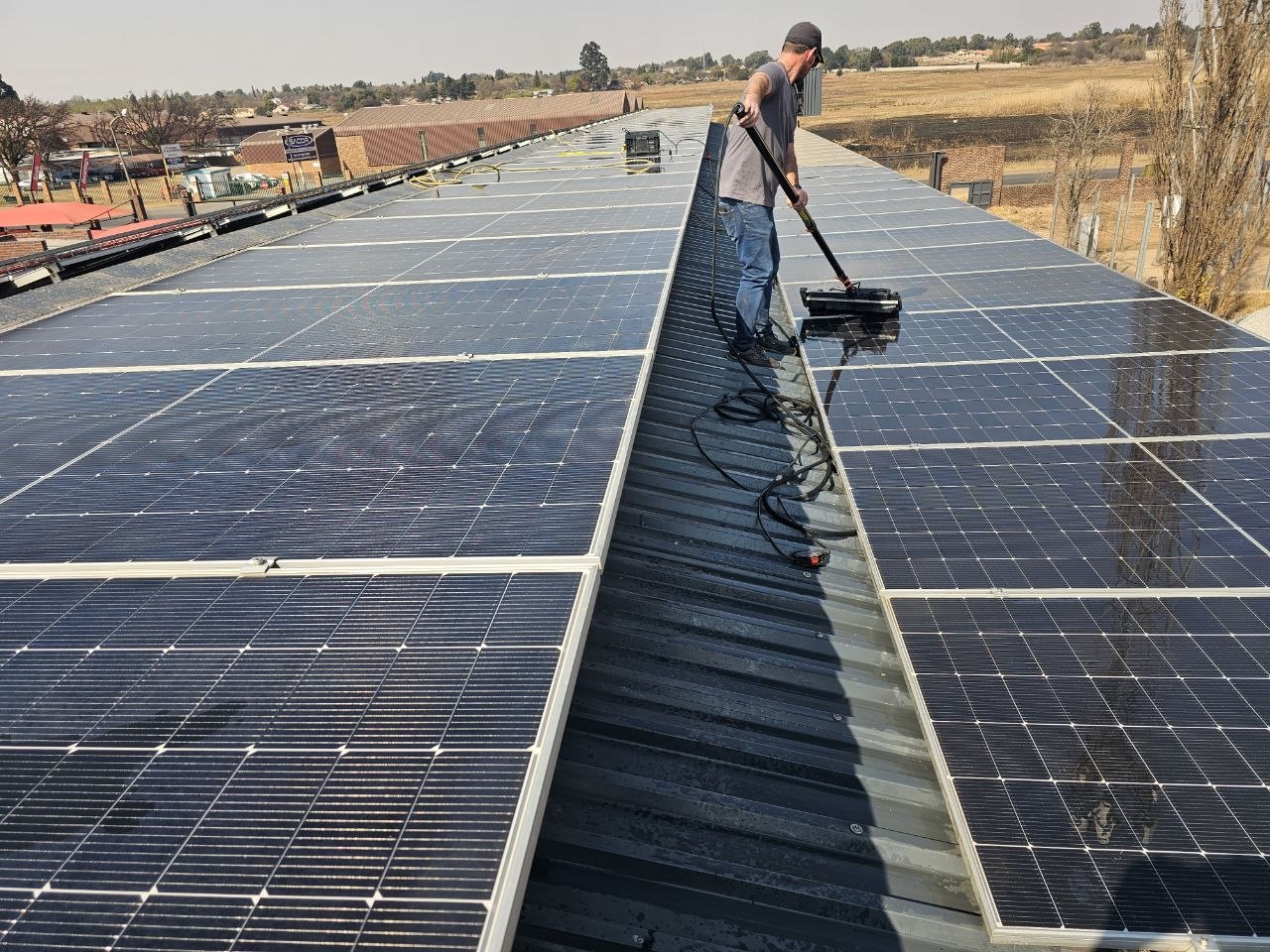 Solar panel cleaning project — Warehouse array in progress