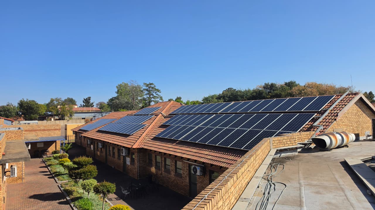 Aerial view of a large clean commercial solar array cleaned by RobCon Electrical in Gauteng