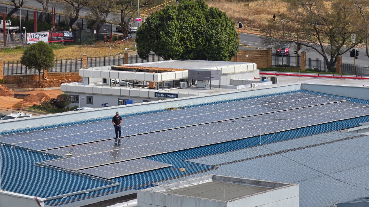 Solar panel cleaning project — Healthcare facility array